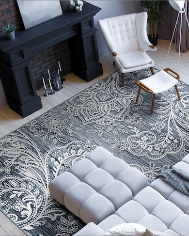 gray living room with modern floral rug